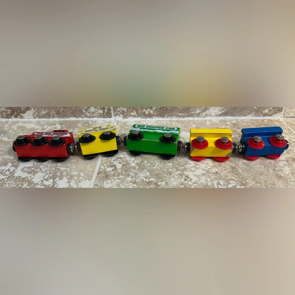 5 wooden train cars (including engine) compatible with Brio and Thomas.